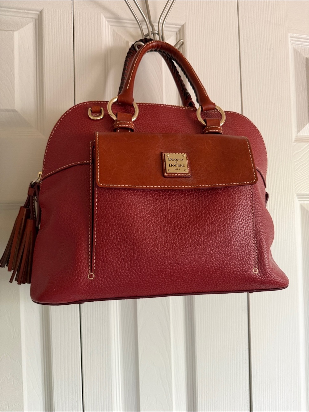 Dooney & Bourke Saddle (Reddish/Brown) Pebbled Leather Satchel with Tassel